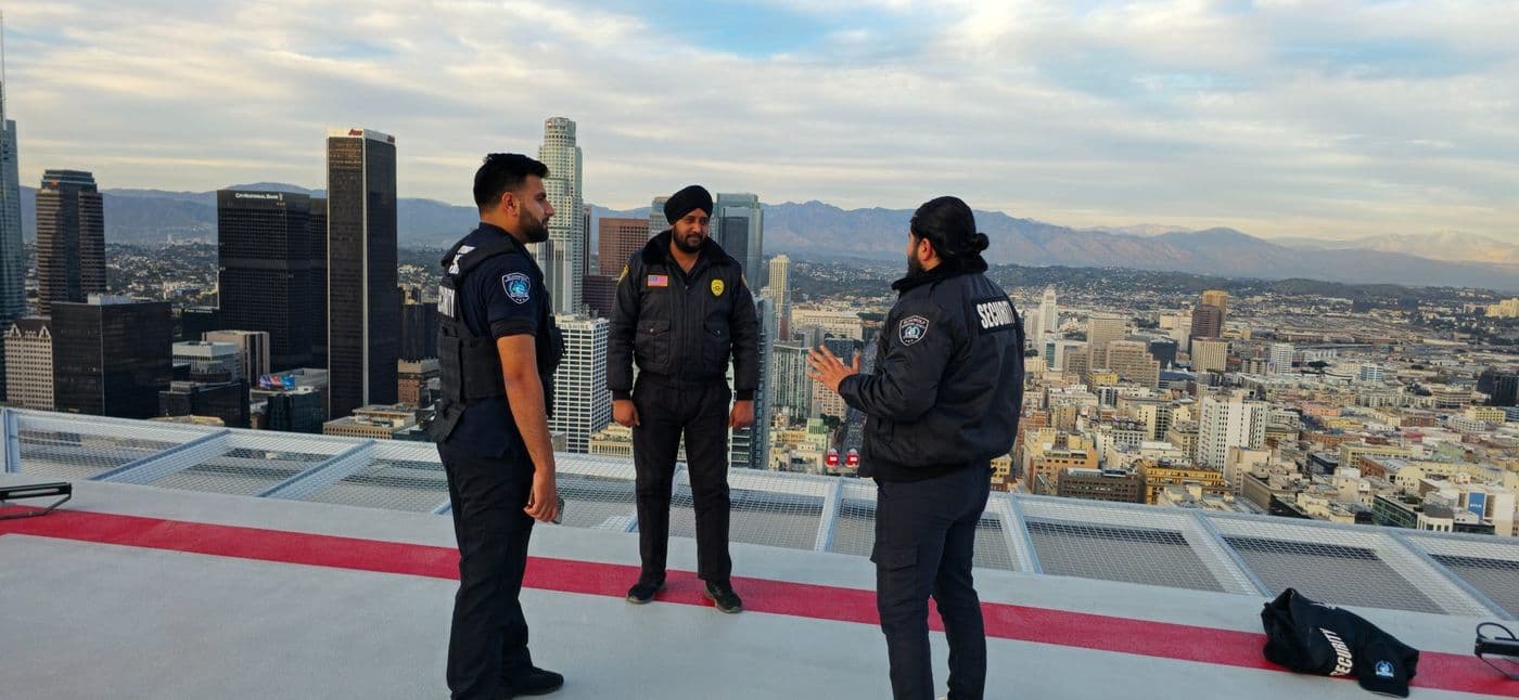 Naji briefing the BlueWolf security team on a rooftop